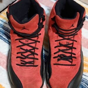 Nike Red and Black Athletic Shoes with Bold Suede Design